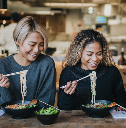 women enjoying wagamamasu0027 ramen