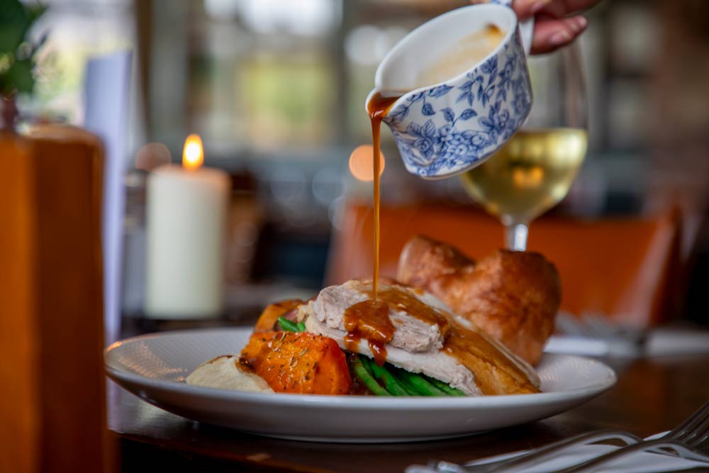 Brunning & Price bartender serving customers